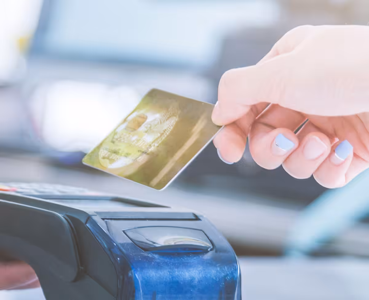 A card about to be swiped in a card reader