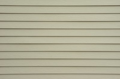 Shiplap Wall Siding Background A background wall of tan shiplap siding.